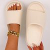 a0db32368acc32b6846061a7a143f0035a3478b886fd61689e0b1b40331277d3.jpg Thick-bottomed Solid Color Bathroom Home Sports Slippers, Beige Women's Slippers