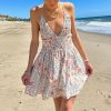 c3c5a39a451f01a7b1ce7e4527b4844fb0438bd9e1a42f7673133812fe438329.jpg Seaside Floral Strap Mini Dress