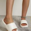 e53dbf2074a7c1825eb6fd23f575edb4af172d51bd42ffad632af617125edd34.jpg Fashion White Slides For Women, Single Band EVA Slippers