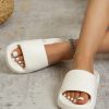 ecf3373f57e1fc616299e937710853468a847af18dfe372a6381eec98533895f.jpg Fashion White Slides For Women, Single Band EVA Slippers