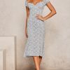 f2b7b59c76f6644361527b8e988d8b45886bbf9ae0f88ce2f4ff605859893883.jpg Puff Sleeves Floral Print Midi Dress